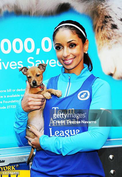 Singer Mya attends the North Shore Animal League America pre-race rally & adoption event at The Algonquin Hotel on November 5, 2011 in New York City.