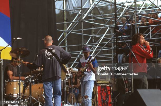 Brad Wilk, Tim Commerford, Zack de la Rocha, and Tom Morello of Rage Against the Machine perform during the Tibetan Freedom Concert at the Polo...