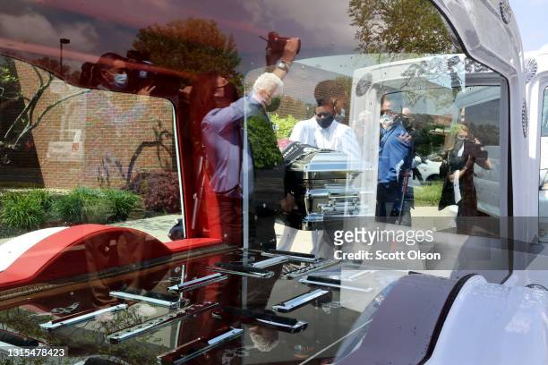 The remains of 16-year-old Ma'Khia Bryant are loaded into a hearse following her funeral service at First Church of God on April 30, 2021 in...