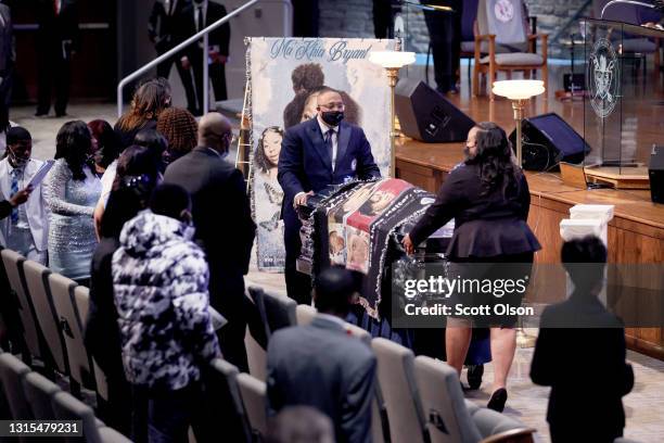 The remains of 16-year-old Ma'Khia Bryant are carried from the chapel following her funeral service at First Church of God on April 30, 2021 in...