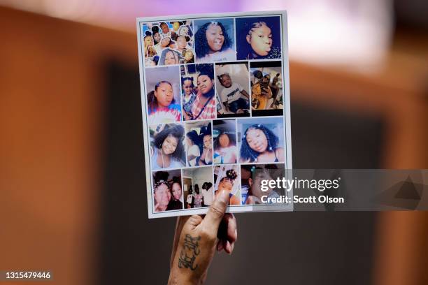 Mourner holds up a funeral program during services for 16-year-old Ma'Khia Bryant at First Church of God on April 30, 2021 in Columbus, Ohio. Bryant...