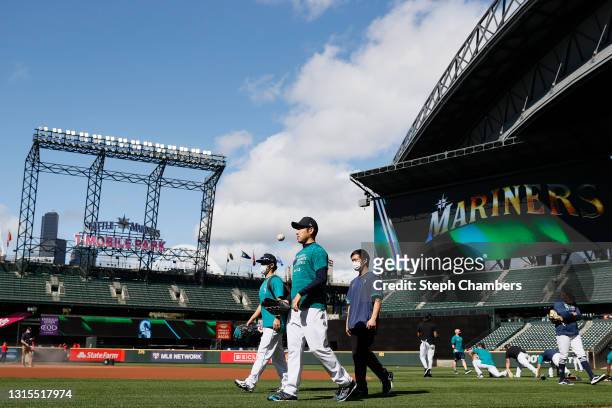 Yusei Kikuchi of the Seattle Mariners walks to the dugout before the game against the Los Angeles Angels at T-Mobile Park on April 30, 2021 in...