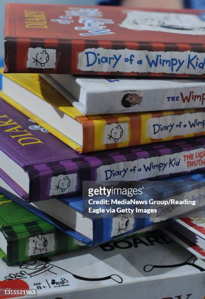 Exeter Township, PA&#10;&#10;A detail photo of a stack of "Diary of a Wimpy Kid" books owned by Connor McHugh of Exeter Township.&#10;&#10;Photo by...
