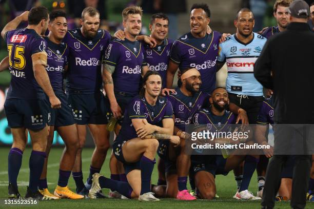 Will Chambers of the Sharks poses with former team mate after the round eight NRL match between the Melbourne Storm and the Cronulla Sharks at AAMI...