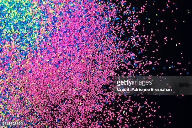 neon sand on black background - the future of everything festival stock pictures, royalty-free photos & images