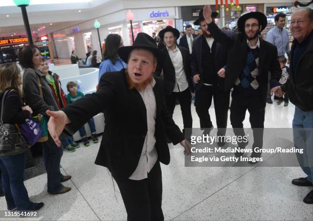 Levi Plotkin, a student at the Rabbinical College of America in Morristown, NJ, tries to get people to dance with him and a group of students from...