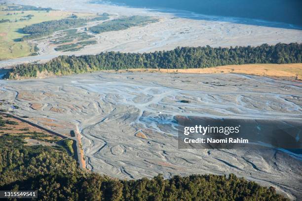 aerial view of a braided river in new zealand - braided river stock pictures, royalty-free photos & images