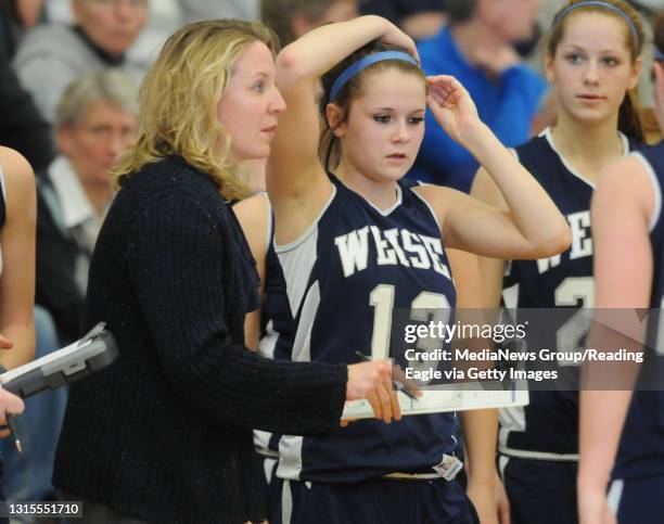 Reading, PAConrad Weiser head coach Adelle Schade with Conrad Weiser's Kennedy Lutz .Girls basketball, the Conrad Weiser Scouts vs the Oley Valley...