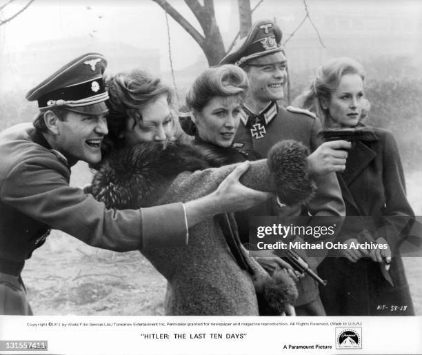 Members of Hitler's bunker Julian Glover Doris Kunstmann Amy Lynn Simon Ward and Sheila Gish out having target practice in a scene from the film...