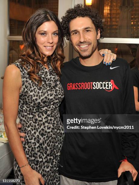 Personalities Jenna Morasca and Ethan Zohn attend a pre-marathon dinner with the Grassroot Soccer 2011 New York Marathon running team at Remi on...