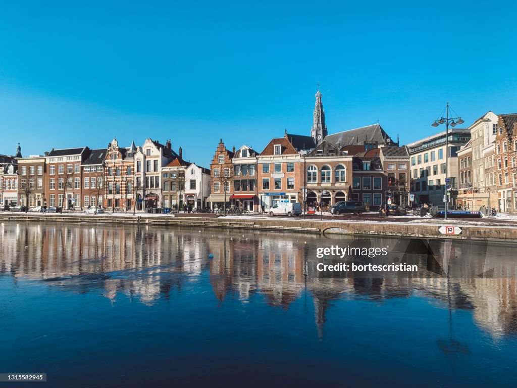 Reflection Of Buildings In River