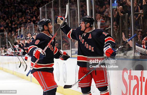 Brad Richards of the New York Rangers celebrates his goal with teammate Brandon Prust against the Montreal Canadiens at Madison Square Garden on...