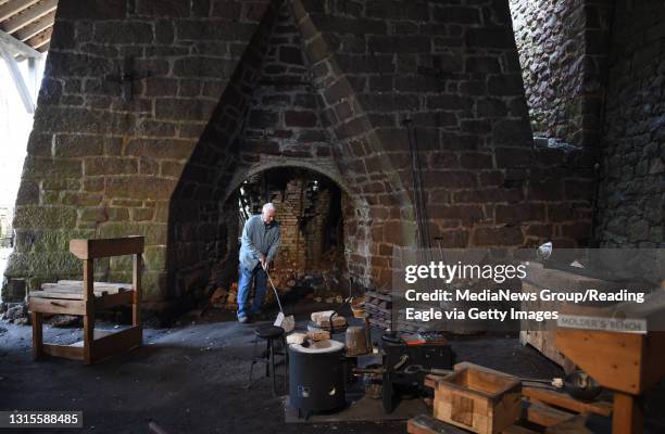 Jack Woods of Paradise Township, Lancaster County, works in the Casting House as the 'Over the Hill Gang' worked at Joanna Furnace Thursday. Photo by...