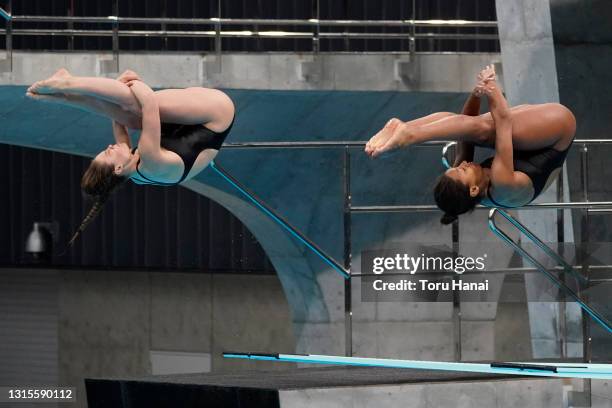 Jennifer Abel and Melissa Citrini Beaulieu of Canada compete in the Women's 3m Synchro Springboard final on day one of the FINA Diving World Cup at...