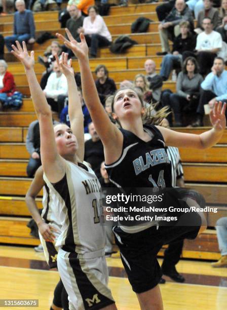 Gov. Mifflin's Kylie Herman defends against Daniel Boone's Julia Bookwalter . The Gov. Mifflin Mustang girls defeated the Daniel Boone Blazers 45-31...