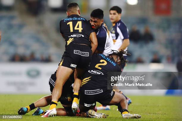 Toni Pulu of the Force tackles Irae Simone of the Brumbies with a shoulder which resulted in a red card during the Super RugbyAU Semi Final match...