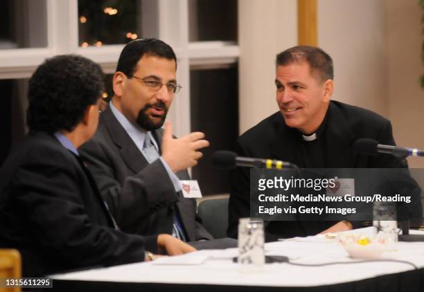 Elsayed "Steve" Elmarzouky, left, Rabbi Brian I. Michelson, and Rev. Philip F. Rodgers talk prior to presenting."A Common Heart", an inter-religious...