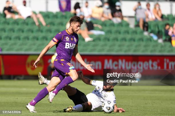 Brandon Wilson of the Glory and Benat Etxebarria of Macarthur FC contest for the ball during the A-League match between Perth Glory and Macarthur FC...