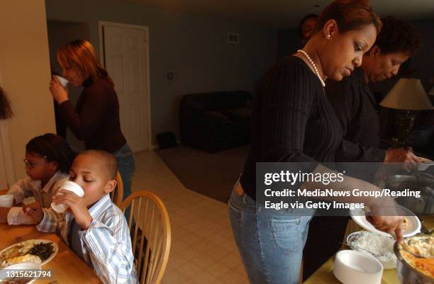 Lauren A. LittleNovember 24, 2005Ciara M. Rouege Macy M. And Daniel J. III eat Thanksgiving dinner as their mother, Shawn N. And grandmother Mary...