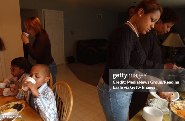 Lauren A. LittleNovember 24, 2005Ciara M. Rouege Macy M. And Daniel J. III eat Thanksgiving dinner as their mother, Shawn N. And grandmother Mary...