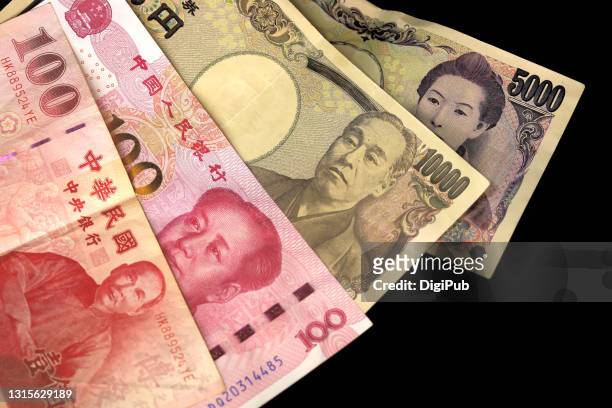 bank notes of japan, china and taiwan - taiwanese currency stock pictures, royalty-free photos & images