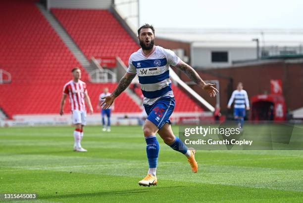 Charlie Austin of Queens Park Rangers celebrates after scoring their team's first goal during the Sky Bet Championship match between Stoke City and...