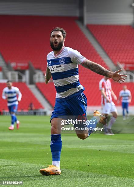 Charlie Austin of Queens Park Rangers celebrates after scoring their team's first goal during the Sky Bet Championship match between Stoke City and...