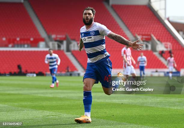 Charlie Austin of Queens Park Rangers celebrates after scoring their team's first goal during the Sky Bet Championship match between Stoke City and...