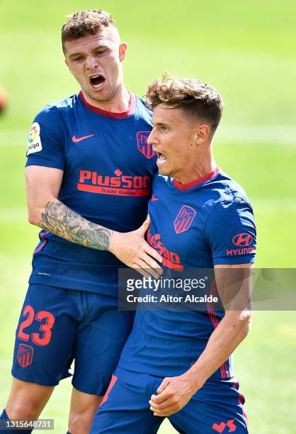 Marcos Llorente of Atletico Madrid celebrates with Kieran Trippier after scoring their team's first goal during the La Liga Santander match between...