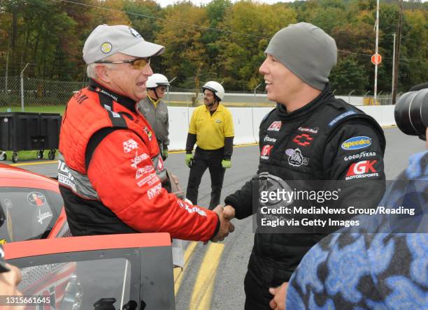 Photo by Harold Hoch - Maple Grove Monday Finals - Pro Stock winner V Gaines is congratulated by runner-up Dave Connolly.