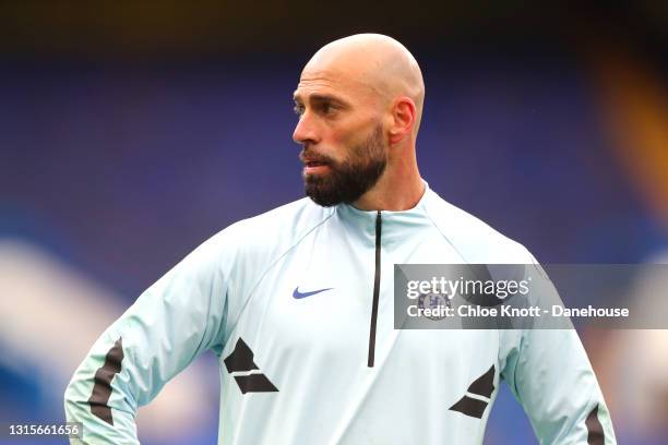 Willy Caballero of Chelsea FC warms up ahead of the Premier League match between Chelsea and Fulham at Stamford Bridge on May 01, 2021 in London,...