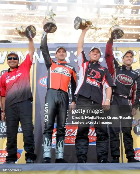 Maple Grove Race Photo by Bill Uhrich Winner's Circle left to right: Funny Car champion Cruz Pedregon, Pro Stock Motorcycle champion Andrew Hines,...