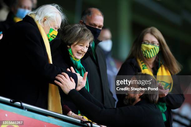 Michael Wynn-Jones and Delia Smith, Owners of Norwich City congratulate Daniel Farke, Manager of Norwich City as their side win the Sky Bet...