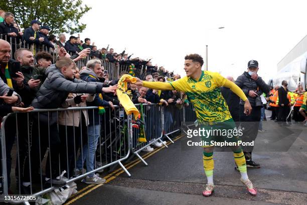 Max Aarons of Norwich City gives a fan his shirt outside the ground after the Sky Bet Championship match between Norwich City and Reading at Carrow...