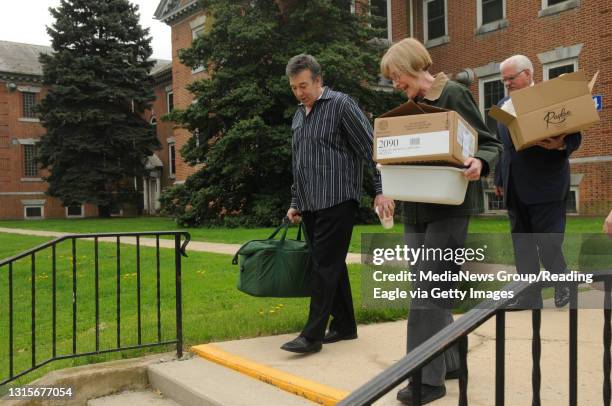 Photo Ryan McFadden Meals on Wheels; leaving the Berks Encore Wernersville site at the Wernersville state hospital is from left, Howard Hafetz, owner...