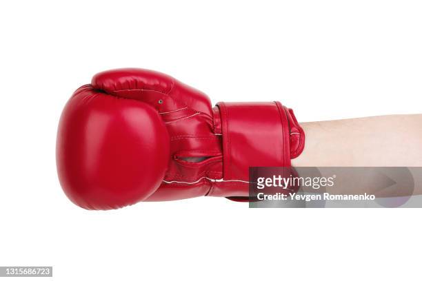 red boxing glove on men's hand isolated on white - punching gloves stock pictures, royalty-free photos & images