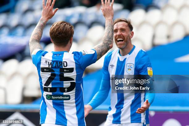 Danny Ward of Huddersfield Town shows the number 25 with his fingers in memory of his friend Jordan Sinnott as he celebrates scoring an equalising...