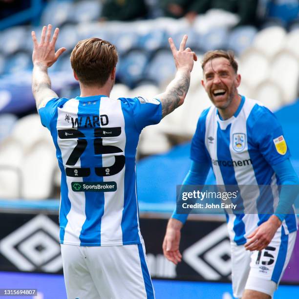 Danny Ward of Huddersfield Town shows the number 25 with his fingers in memory of his friend Jordan Sinnott as he celebrates scoring an equalising...