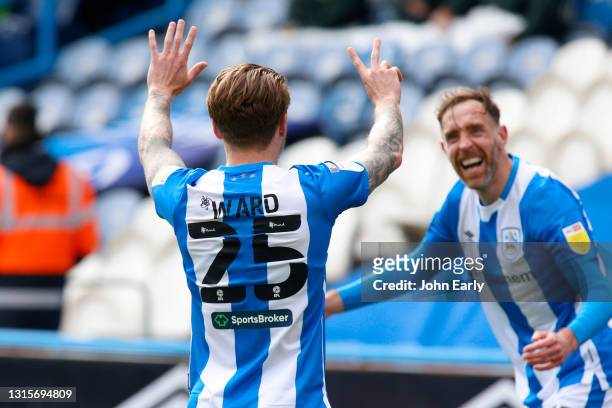 Danny Ward of Huddersfield Town shows the number 25 with his fingers in memory of his friend Jordan Sinnott as he celebrates scoring an equalising...