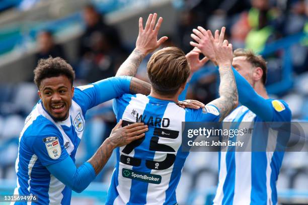 Danny Ward of Huddersfield Town shows the number 25 with his fingers in memory of his friend Jordan Sinnott as he celebrates scoring an equalising...