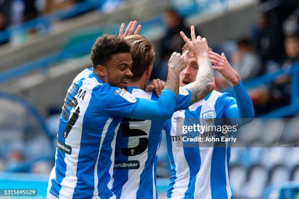 Danny Ward of Huddersfield Town shows the number 25 with his fingers in memory of his friend Jordan Sinnott as he celebrates scoring an equalising...