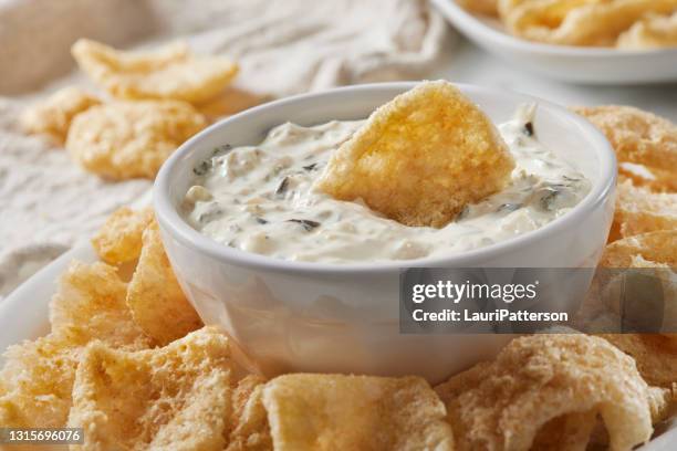 spinach dip with crispy pork rinds - dips stock pictures, royalty-free photos & images