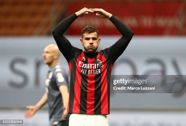 Theo Hernandez of A.C. Milan celebrates after scoring their side's second goal during the Serie A match between AC Milan and Benevento Calcio at...