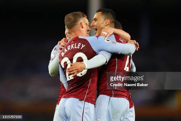 Anwar El Ghazi of Aston Villa celebrates with Ross Barkley after scoring their side's second goal during the Premier League match between Everton and...