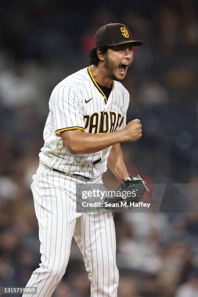 Yu Darvish of the San Diego Padres reacts to striking out Alex Dickerson of the San Francisco Giants during the sixth inning of a game at PETCO Park...