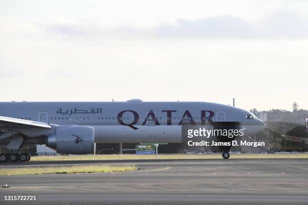 Qatar Airways flight QR908, a Boeing 777 aircraft from Doha to Sydney lands at Sydney International Airport on May 01, 2021 in Sydney, Australia....