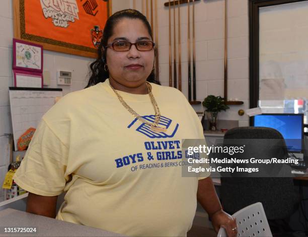 Photo by Tim Leedy 9/21/13Miriam Feliciano a volunteer at the Olivet Club on Pershing Blvd. For Person of the week.