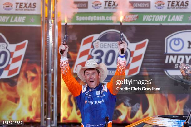 Scott Dixon of New Zealand, driver of the PNC Bank Chip Ganassi Racing Honda, celebrates in Victory Lane after winning the NTT IndyCar Series Genesys...