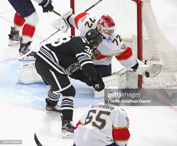 Sergei Bobrovsky of the Florida Panthers makes a save on a shot by Brandon Hagel of the Chicago Blackhawks at the United Center on May 01, 2021 in...