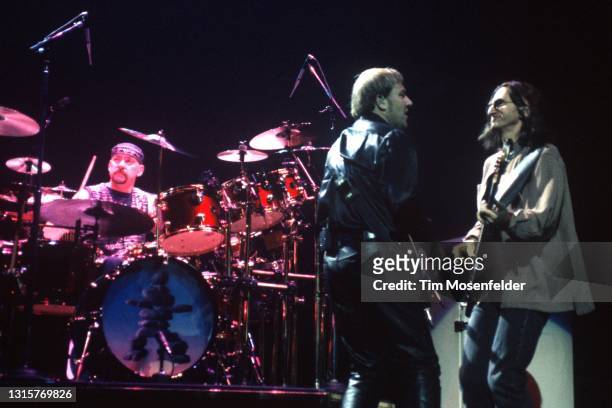 Neil Peart, Alex Lifeson, and Geddy Lee of Rush perform at San Jose Arena on November 20, 1996 in San Jose, California.